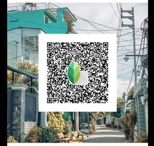 Street photo edited with Snapseed DSLR QR code for realistic look